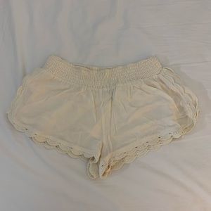 White lace-trim flowy shorts